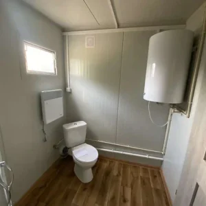 Contenedor habitacional totalmente equipado, con cocina, baño, ducha y WC